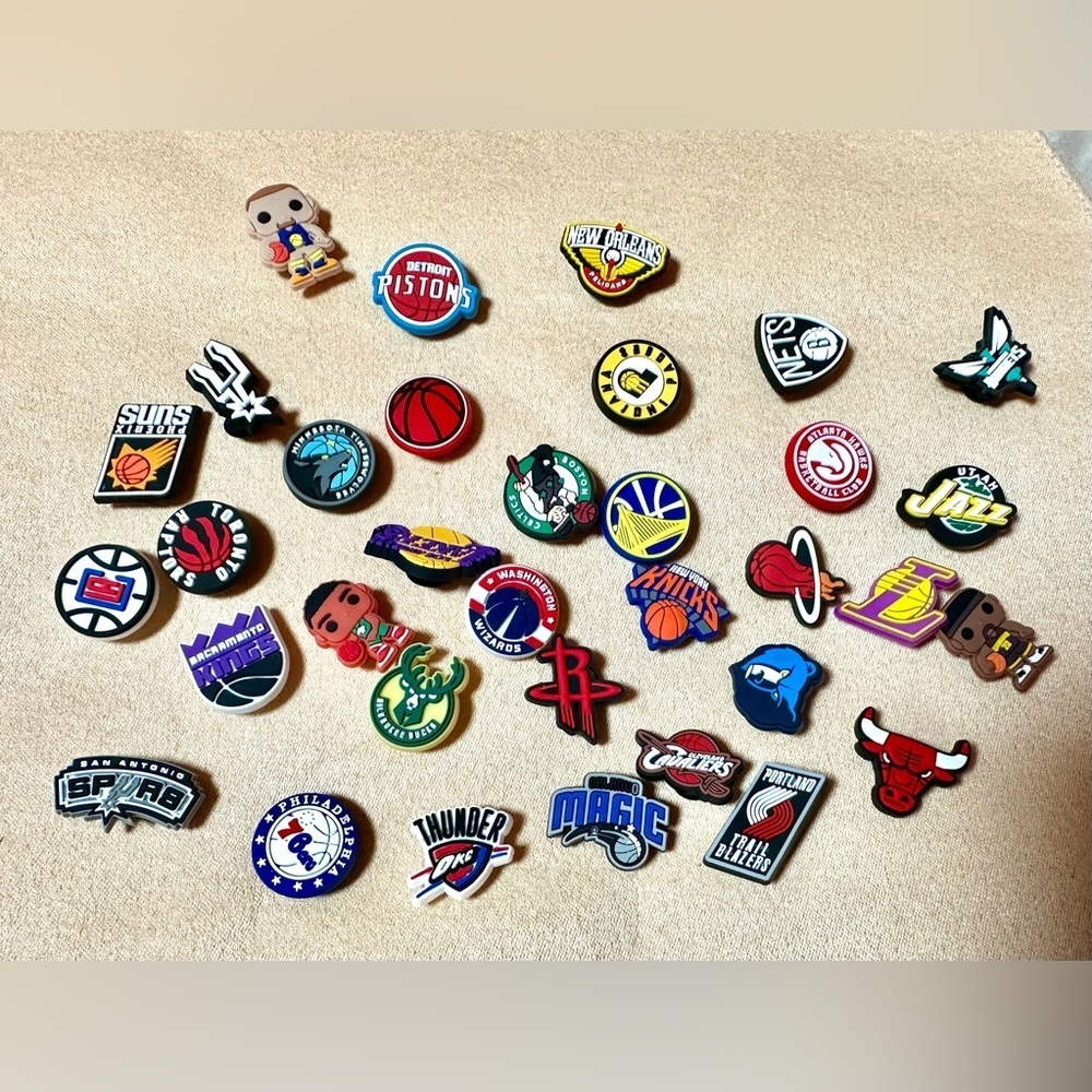 NBA-themed Jibbitz shoe charms, designed to personalize Crocs footwear